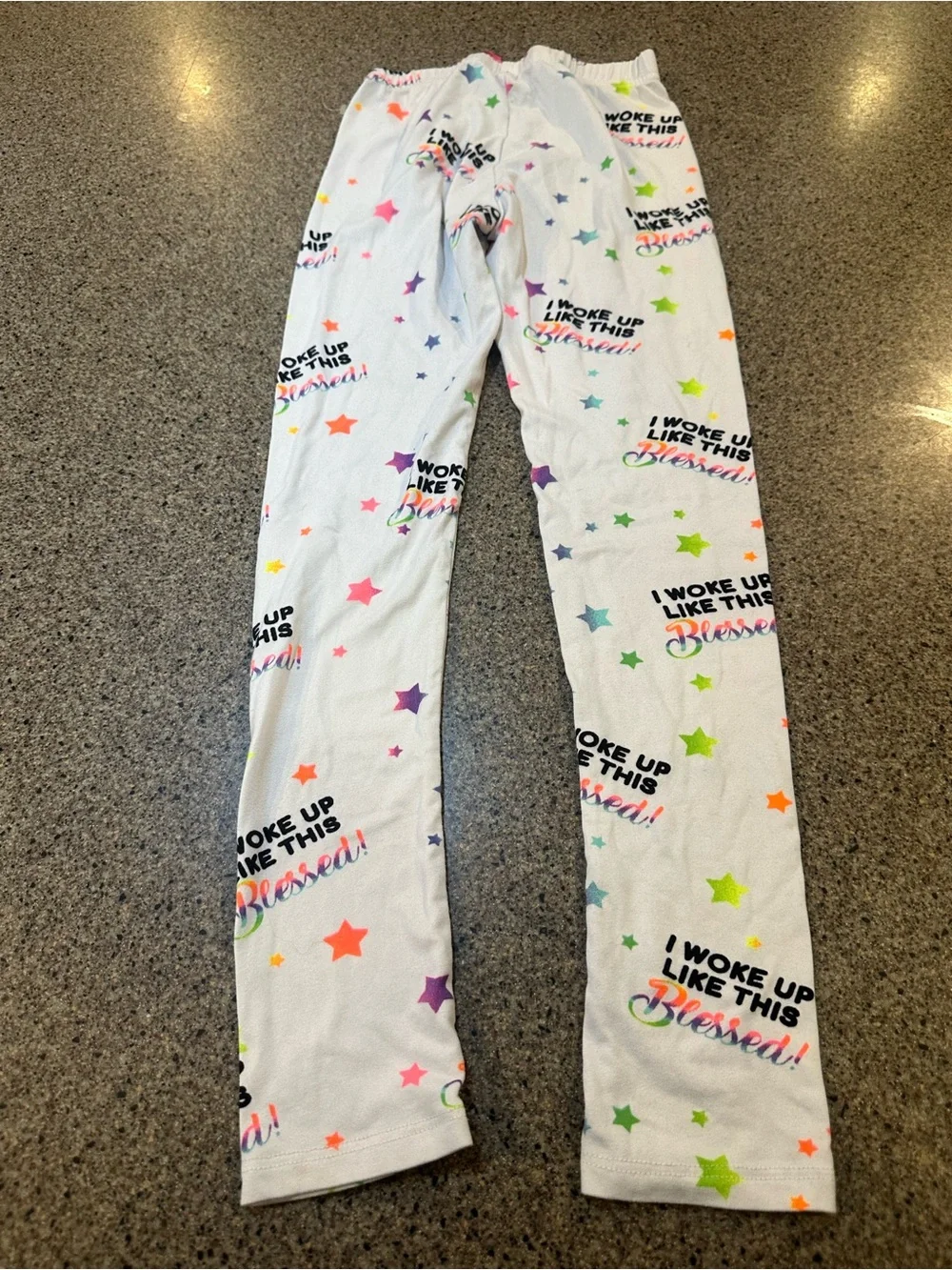 Place White Pajama Bottoms with Multicolor Stars and Text